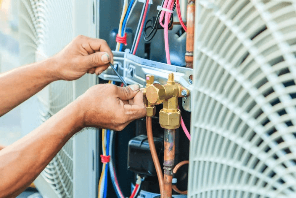Refrigeration technician at work
